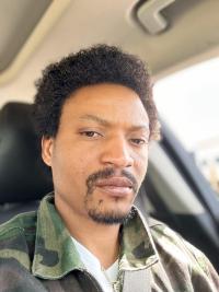 Click to download Headshot of Philip Umukoro